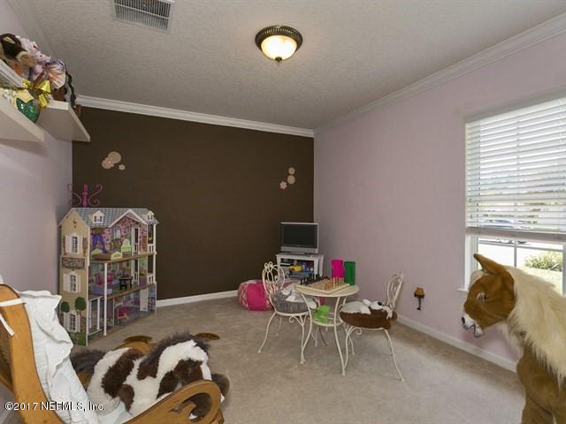1204 Ribbon Road St. Johns, FL 32259 - Photo 13 of 26 a living room with furniture and a window