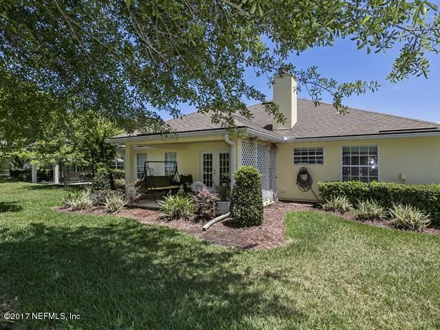 1204 Ribbon Road St. Johns, FL 32259 - Photo 16 of 26 a view of a house with a yard and sitting area