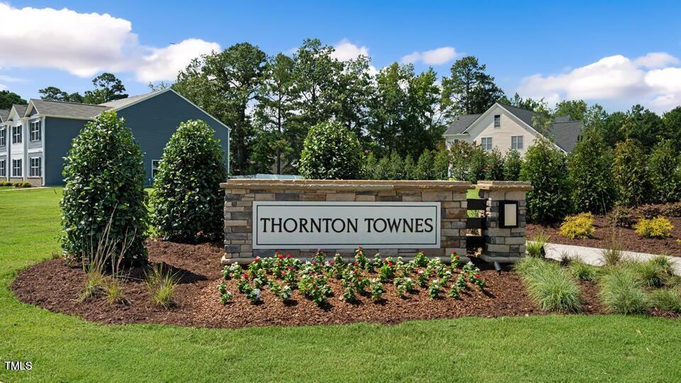 8514 Beckett Chase Way Raleigh, NC 27616 - Photo 29 of 29 a sign that is sitting on a lush green field