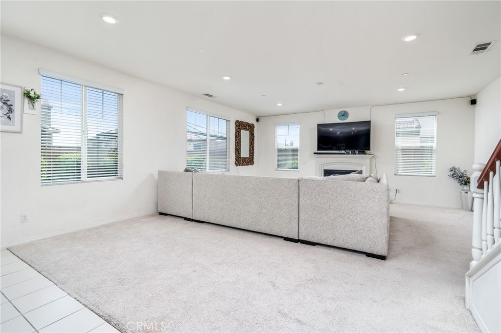 13243 Stanton Drive Rancho Cucamonga, CA 91739 - Photo 12 of 53 a living room with furniture and a flat screen tv
