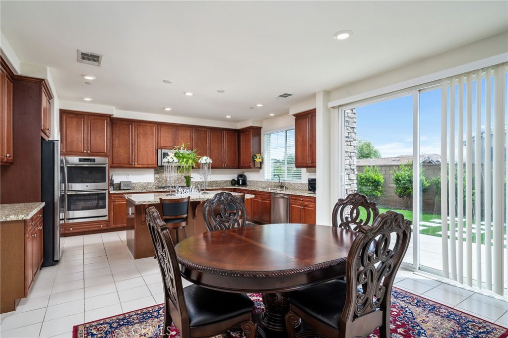 13243 Stanton Drive Rancho Cucamonga, CA 91739 - Photo 14 of 53 a view of a dining room with furniture window and outside view