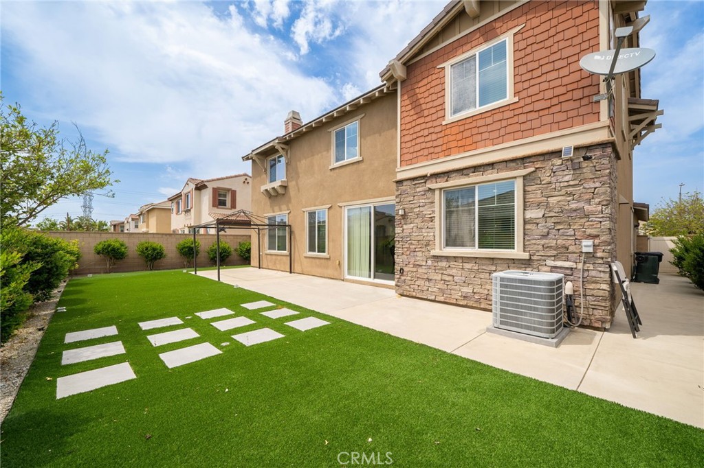 13243 Stanton Drive Rancho Cucamonga, CA 91739 - Photo 37 of 53 a front view of a house with a yard