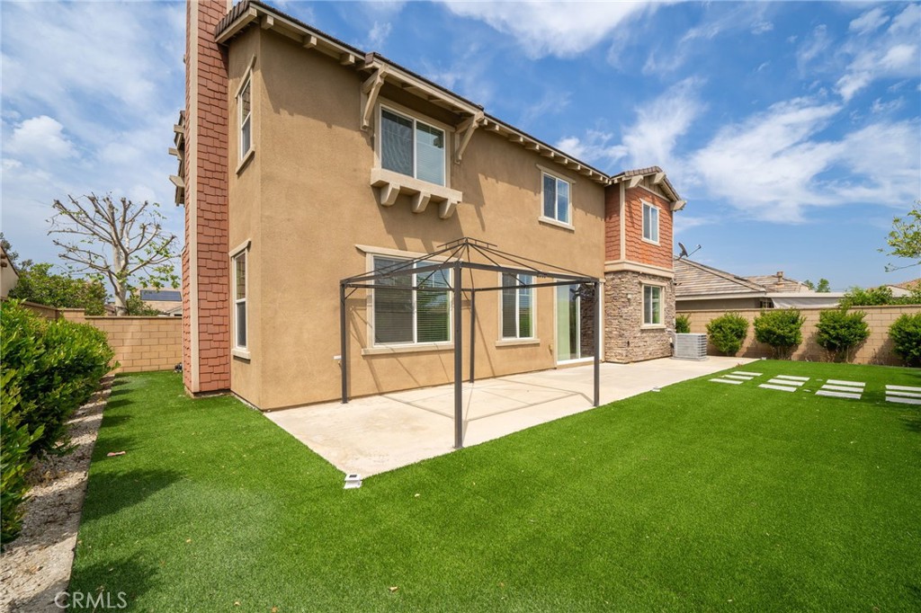 13243 Stanton Drive Rancho Cucamonga, CA 91739 - Photo 38 of 53 a view of an house with backyard porch and garden