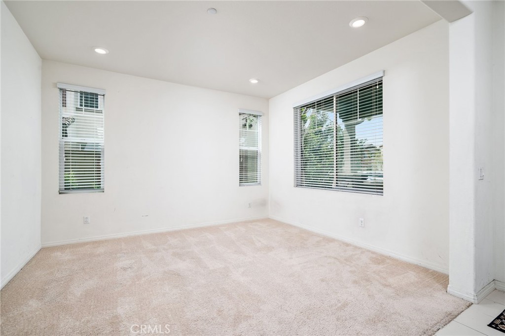 13243 Stanton Drive Rancho Cucamonga, CA 91739 - Photo 8 of 53 a view of an empty room with a window