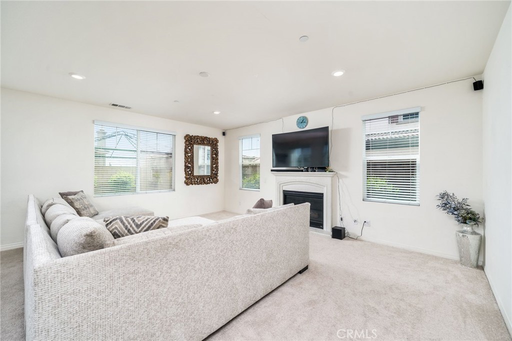 13243 Stanton Drive Rancho Cucamonga, CA 91739 - Photo 10 of 53 a living room with furniture and a flat screen tv