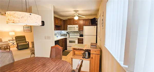 a bedroom with furniture and a fireplace