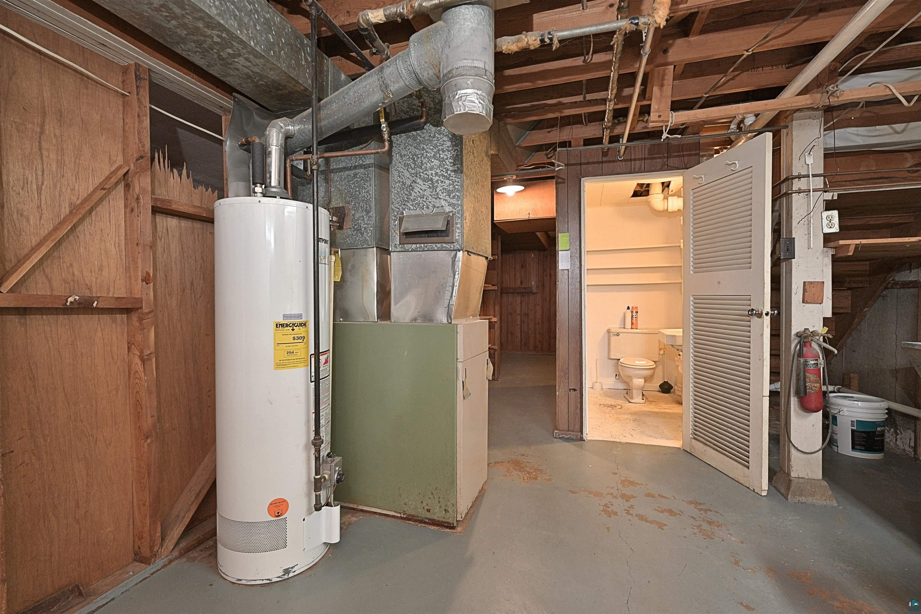 18 Banks Boulevard Silver Bay, MN 55614 - Photo 20 of 26 Utilities featuring water heater and heating unit