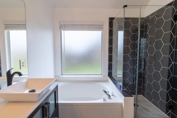 a bathroom with a sink and a bathtub