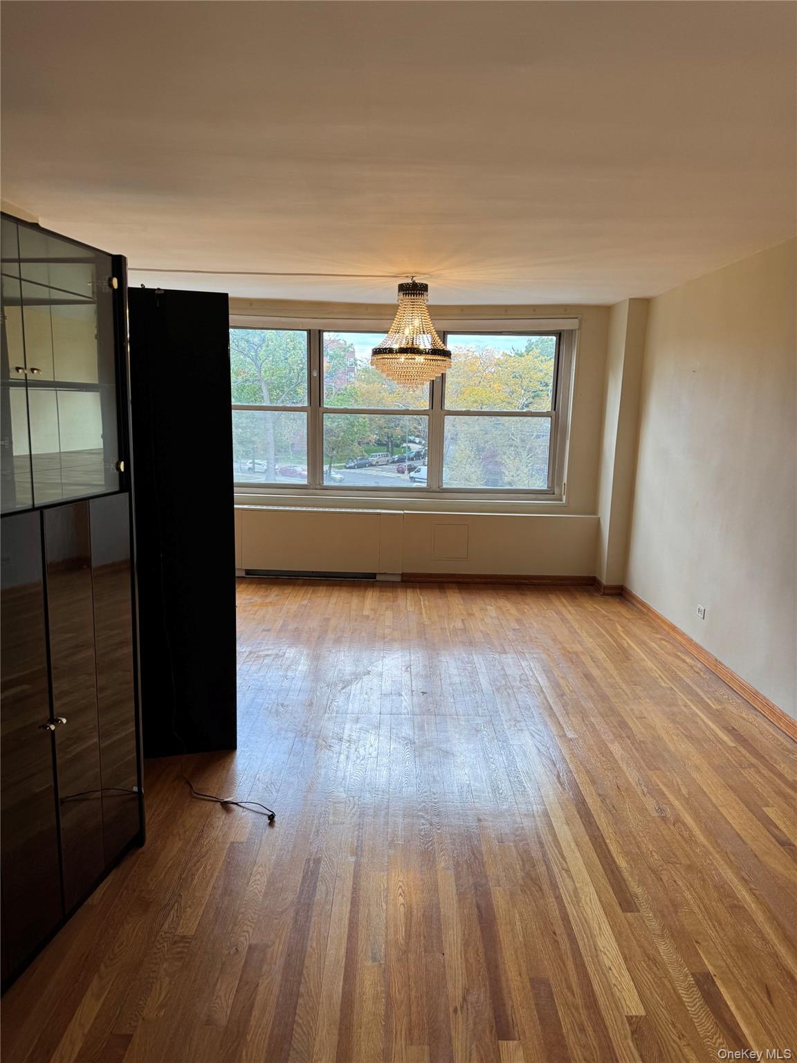 211-40 18th Avenue, Unit 4J Queens, NY 11360 - Photo 3 of 7 Huge Living Room facing South