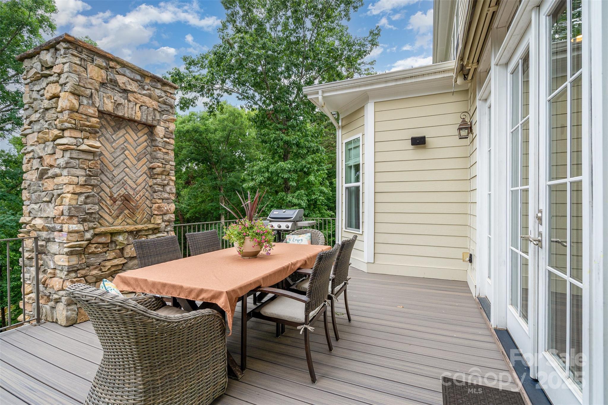 6873 Pine Moss Lane Clover, SC 29710 - Photo 19 of 46 a view of a dinning table and chairs in the balcony