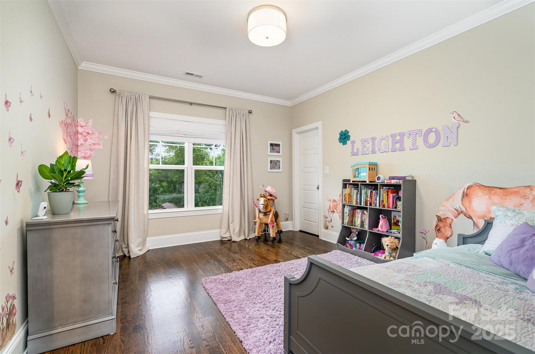 6873 Pine Moss Lane Clover, SC 29710 - Photo 26 of 46 a living room with furniture and a book shelf