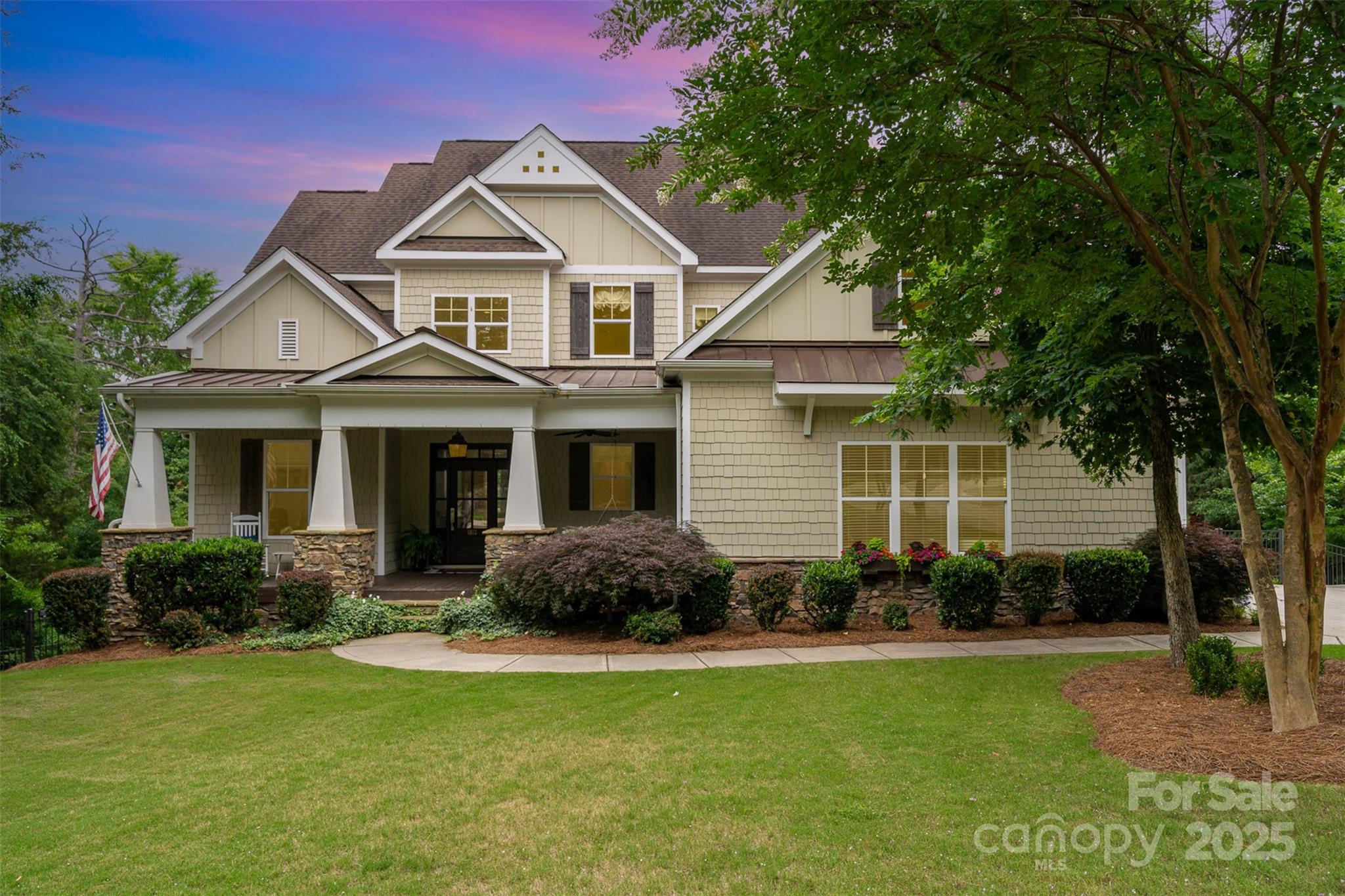 6873 Pine Moss Lane Clover, SC 29710 - Photo 3 of 46 a front view of a house with a yard and porch