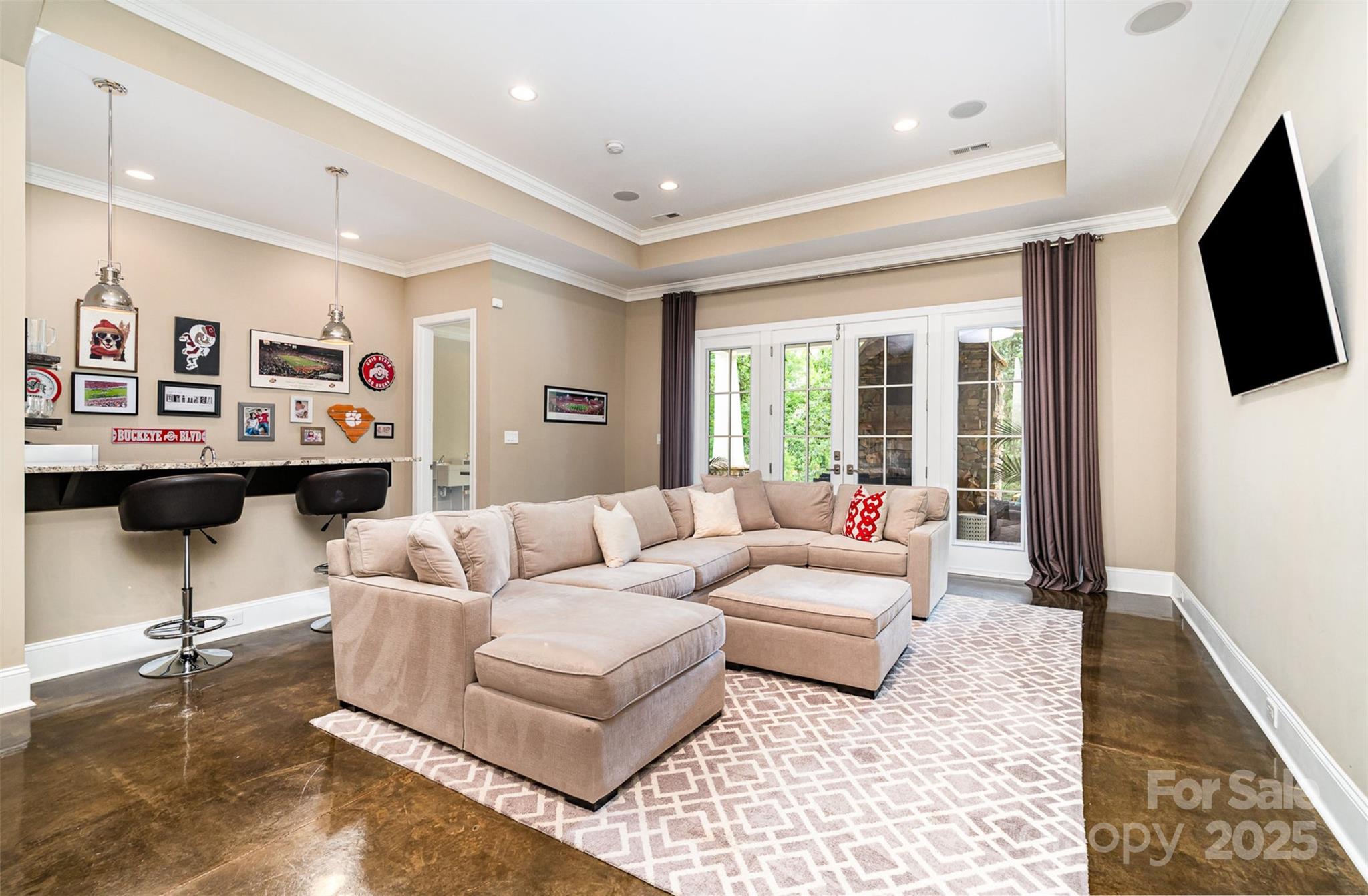 6873 Pine Moss Lane Clover, SC 29710 - Photo 31 of 46 a living room with furniture and a flat screen tv