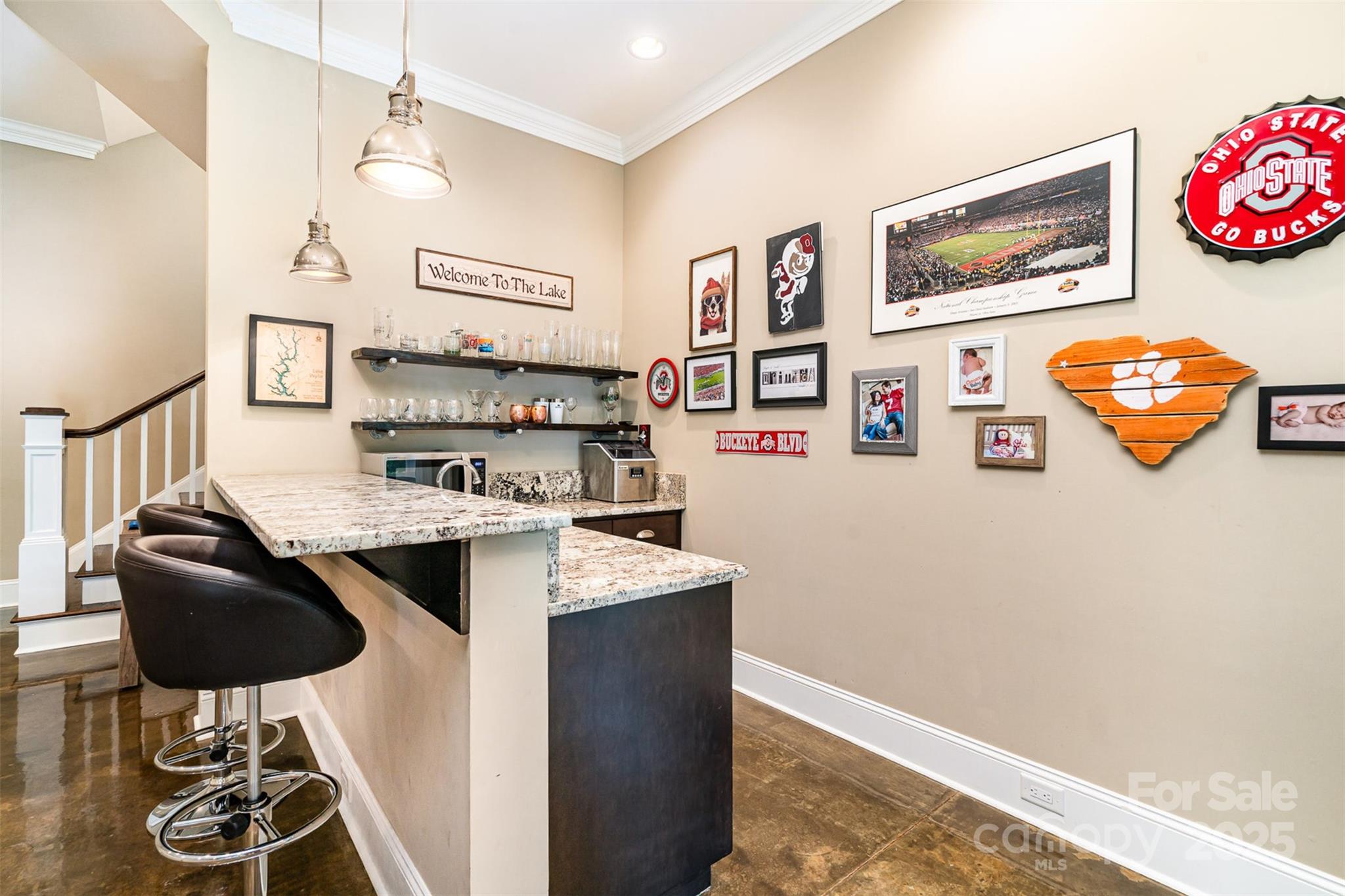 6873 Pine Moss Lane Clover, SC 29710 - Photo 32 of 46 a kitchen with granite countertop a refrigerator and a stove
