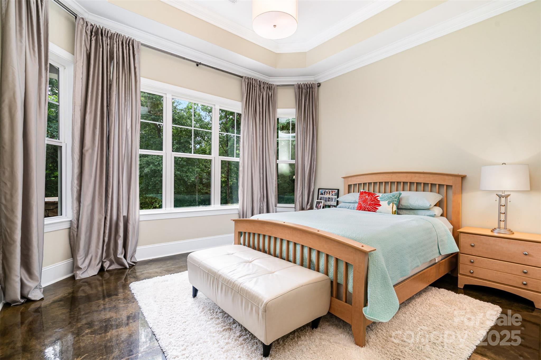 6873 Pine Moss Lane Clover, SC 29710 - Photo 34 of 46 a bedroom with a bed lamp and a window