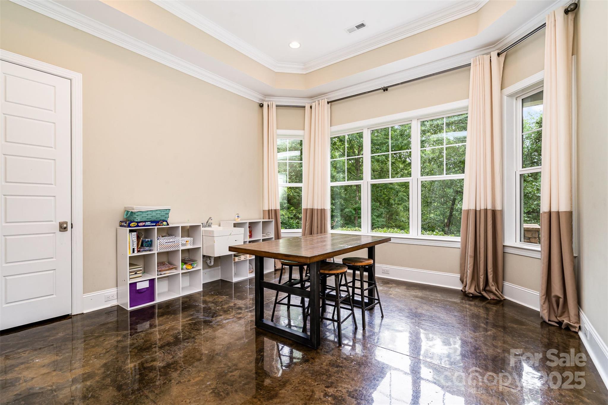 6873 Pine Moss Lane Clover, SC 29710 - Photo 37 of 46 a view of a dining room with furniture window and outside view