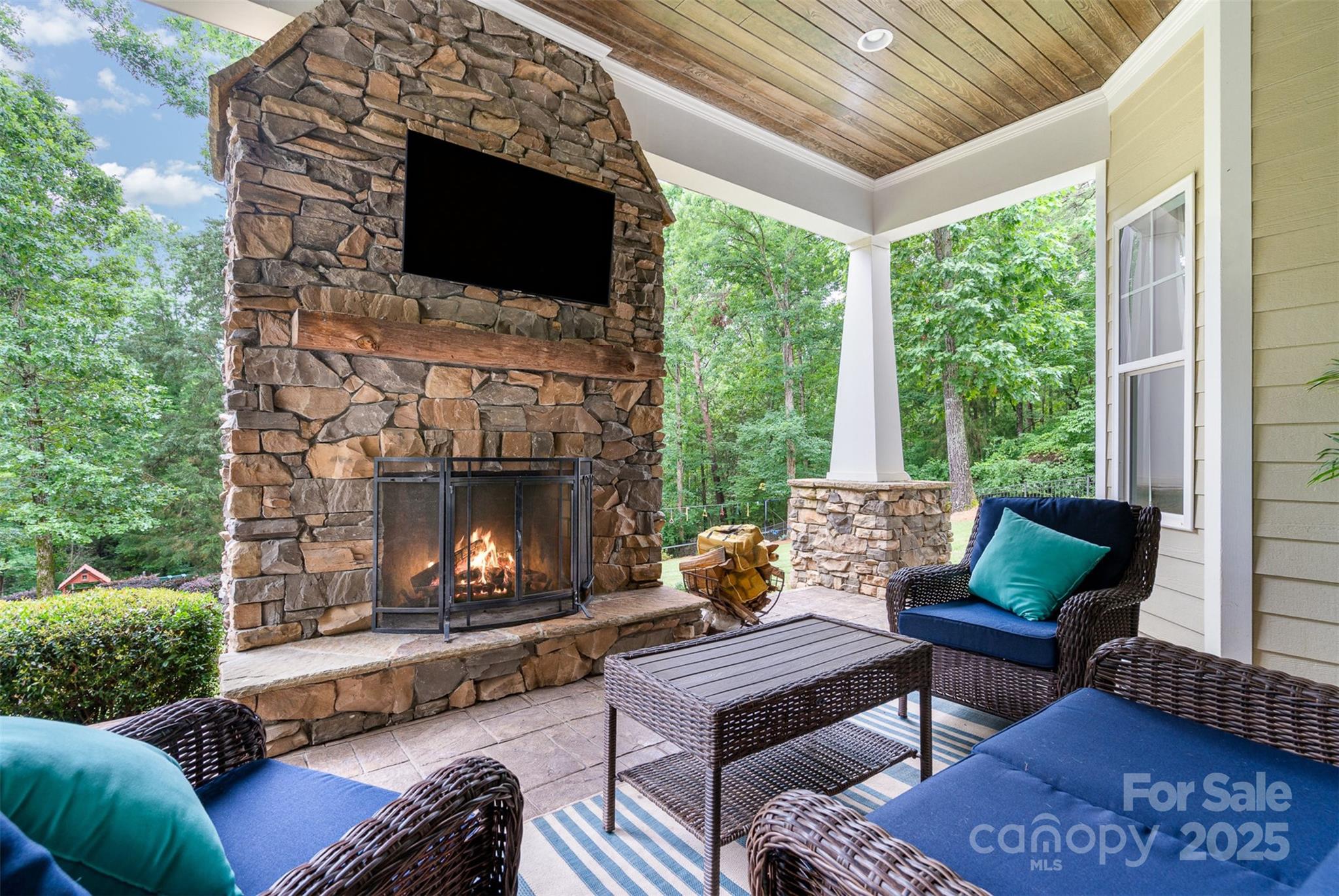 6873 Pine Moss Lane Clover, SC 29710 - Photo 39 of 46 a outdoor living space with furniture and a fireplace