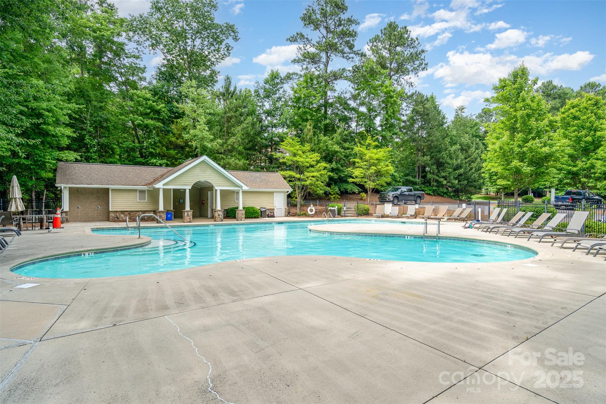 6873 Pine Moss Lane Clover, SC 29710 - Photo 45 of 46 a view of house with outdoor space and trees in the background