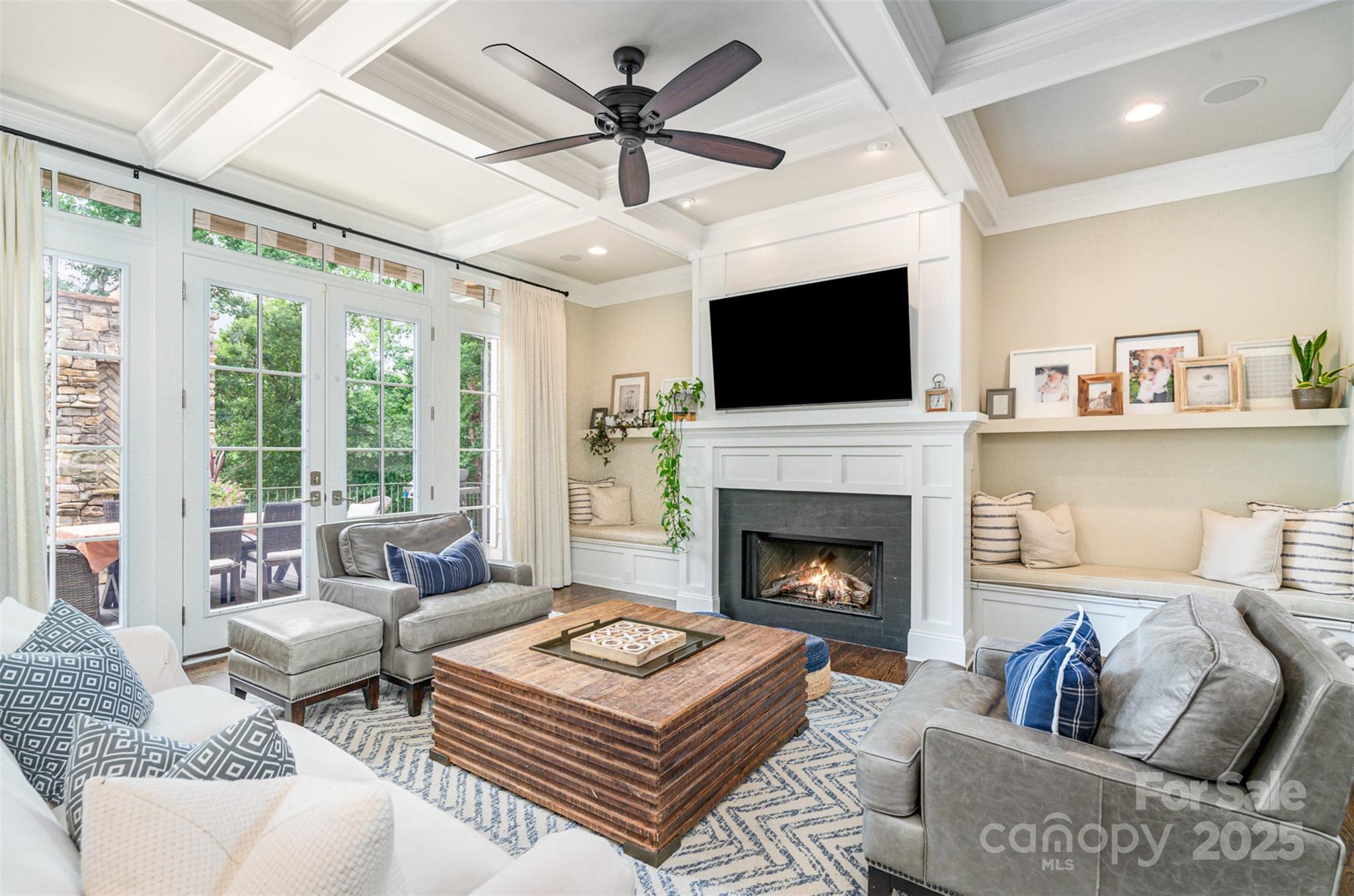 6873 Pine Moss Lane Clover, SC 29710 - Photo 7 of 46 a living room with furniture a flat screen tv and a fireplace