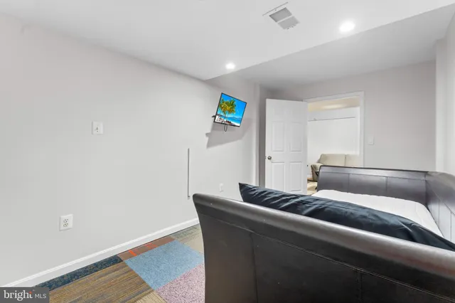 a living room with furniture and a couch