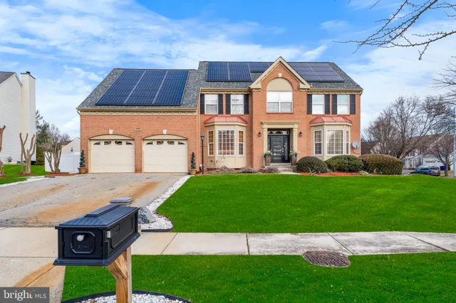 a aerial view of a house having outdoor space