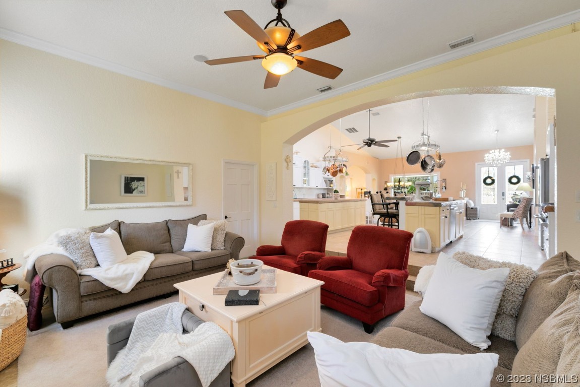 1780 Old Mission Road Edgewater, FL 32132 - Photo 17 of 55 a living room with furniture and a large window