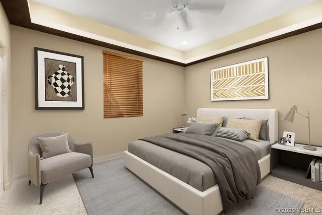 a bedroom with bed and a couch