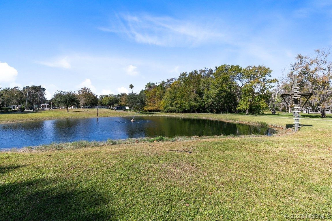 1780 Old Mission Road Edgewater, FL 32132 - Photo 46 of 55 a view of a lake with houses in the background