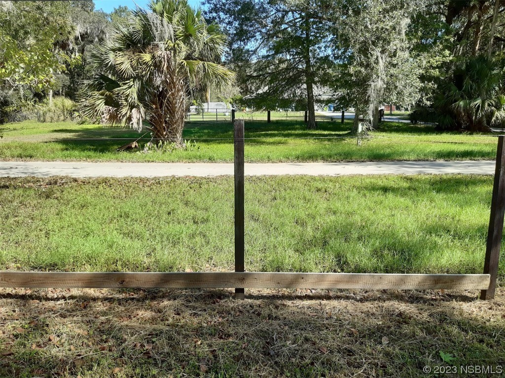 1780 Old Mission Road Edgewater, FL 32132 - Photo 51 of 55 a view of grassy field with trees