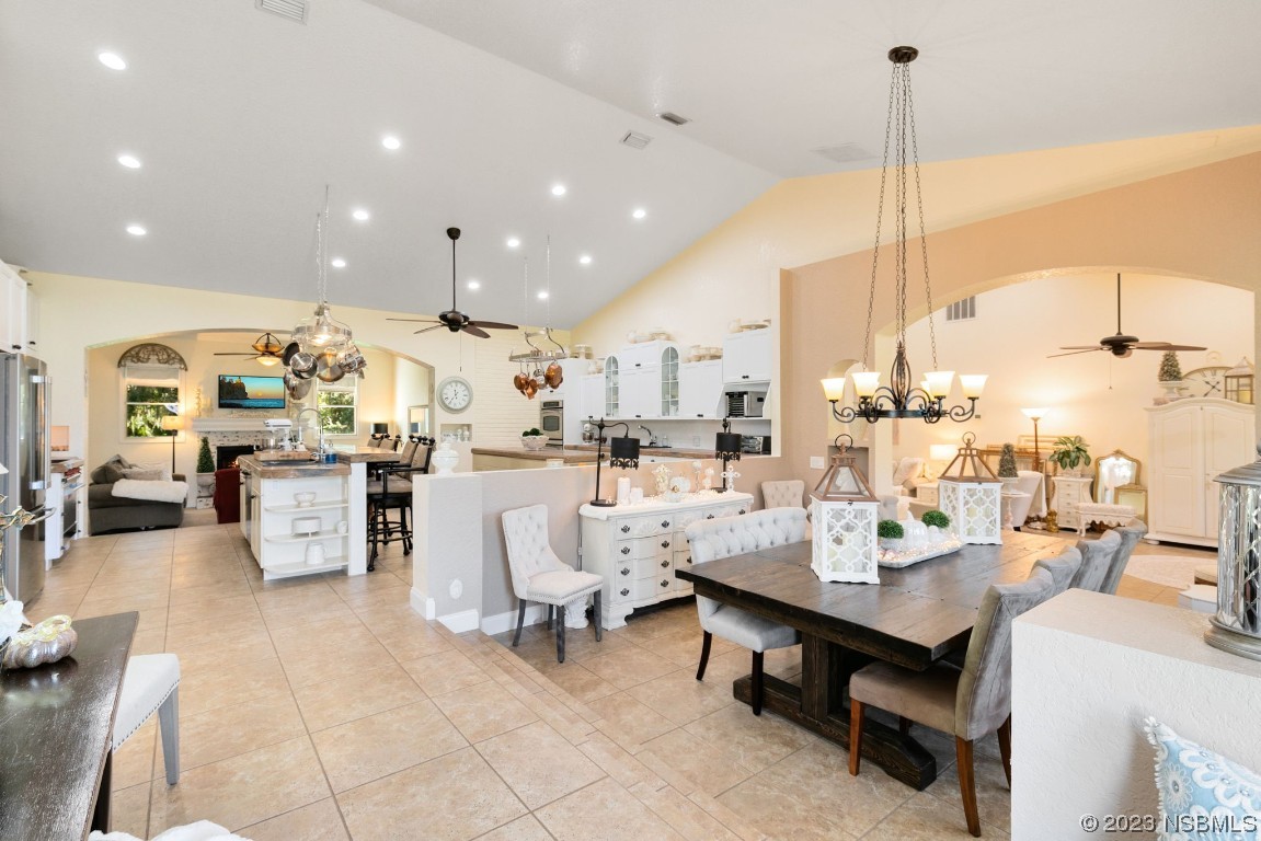 1780 Old Mission Road Edgewater, FL 32132 - Photo 7 of 55 a large kitchen with a table and chairs