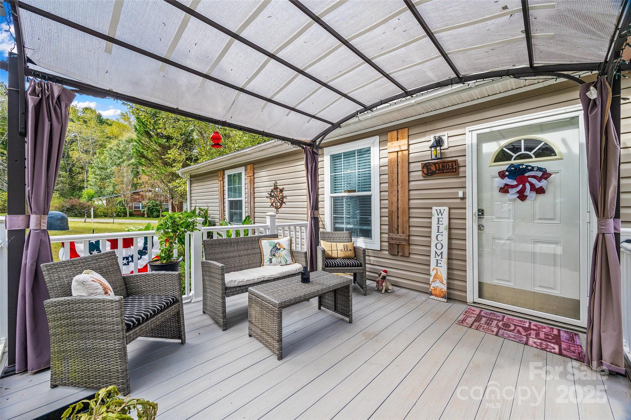 1804 Tom Joye Road Clover, SC 29710 - Photo 23 of 28 a outdoor living space with furniture and garden view