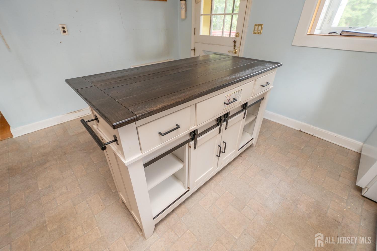 203 New Market Road Dunellen, NJ 08812 - Photo 16 of 44 an aerial view of a kitchen