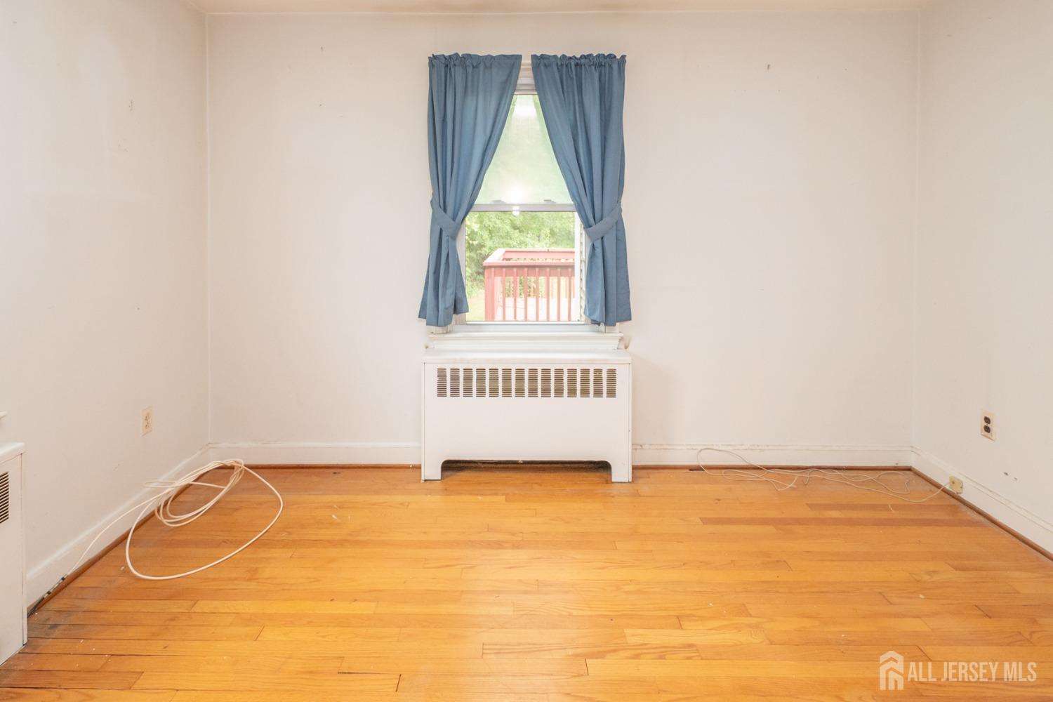 203 New Market Road Dunellen, NJ 08812 - Photo 27 of 44 a view of an empty room