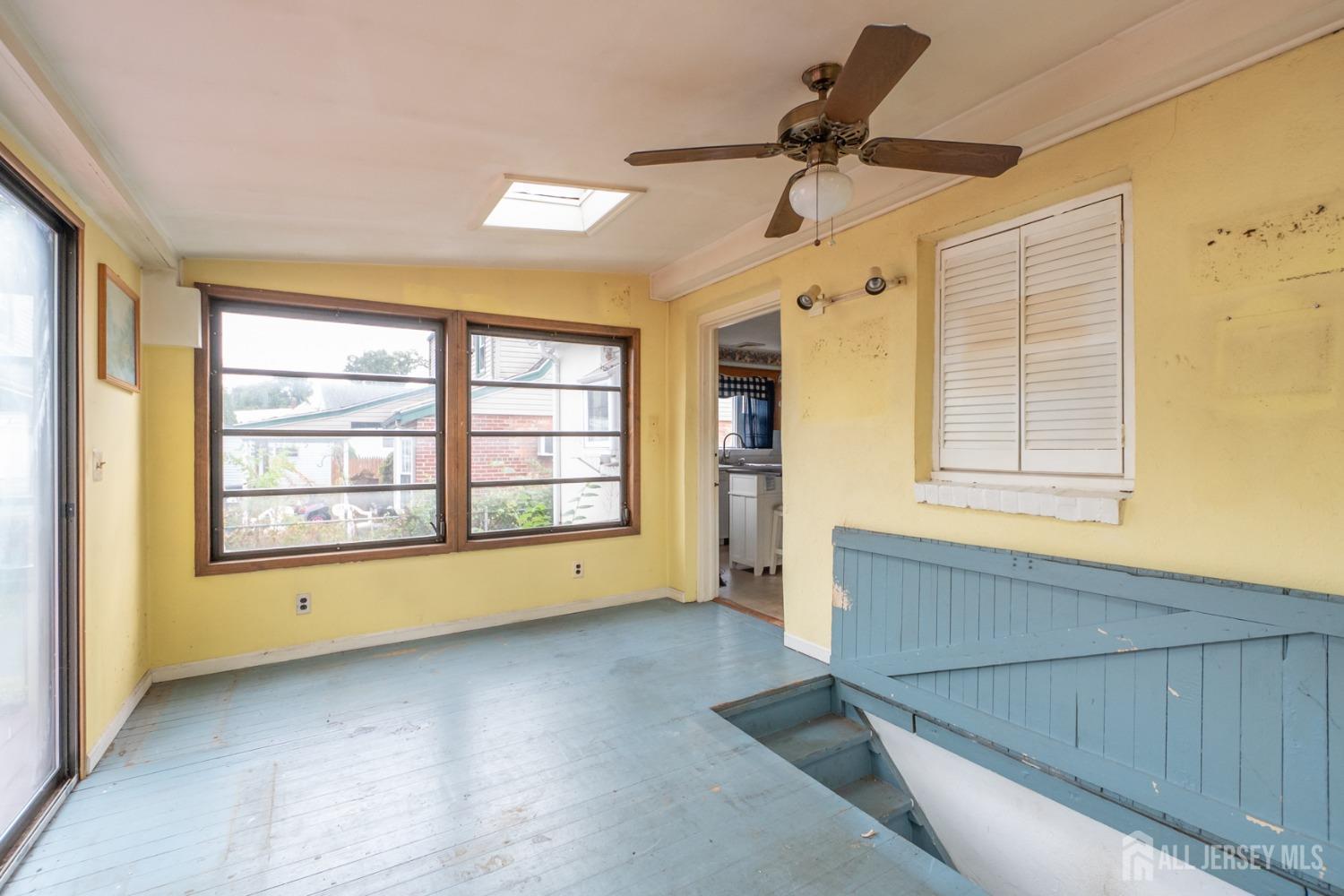 203 New Market Road Dunellen, NJ 08812 - Photo 31 of 44 a view of an empty room with a window
