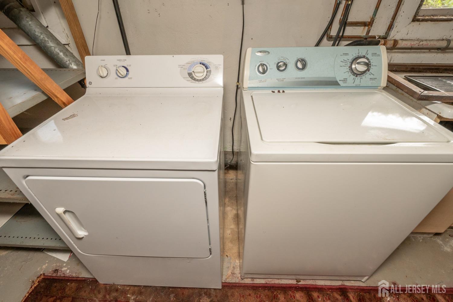 203 New Market Road Dunellen, NJ 08812 - Photo 36 of 44 a close up view of washer and dryer