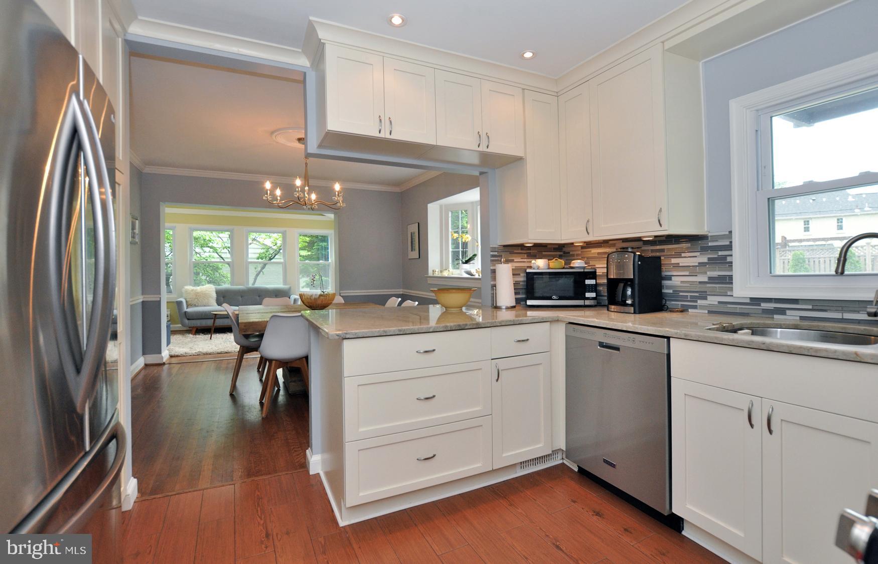 5602 Harwick Road Bethesda, MD 20816 - Photo 14 of 37 Open concept to dining area and den