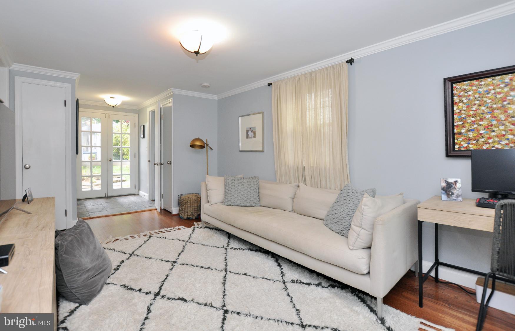 5602 Harwick Road Bethesda, MD 20816 - Photo 22 of 37 A SECOND den on the 1st floor also leads to patio