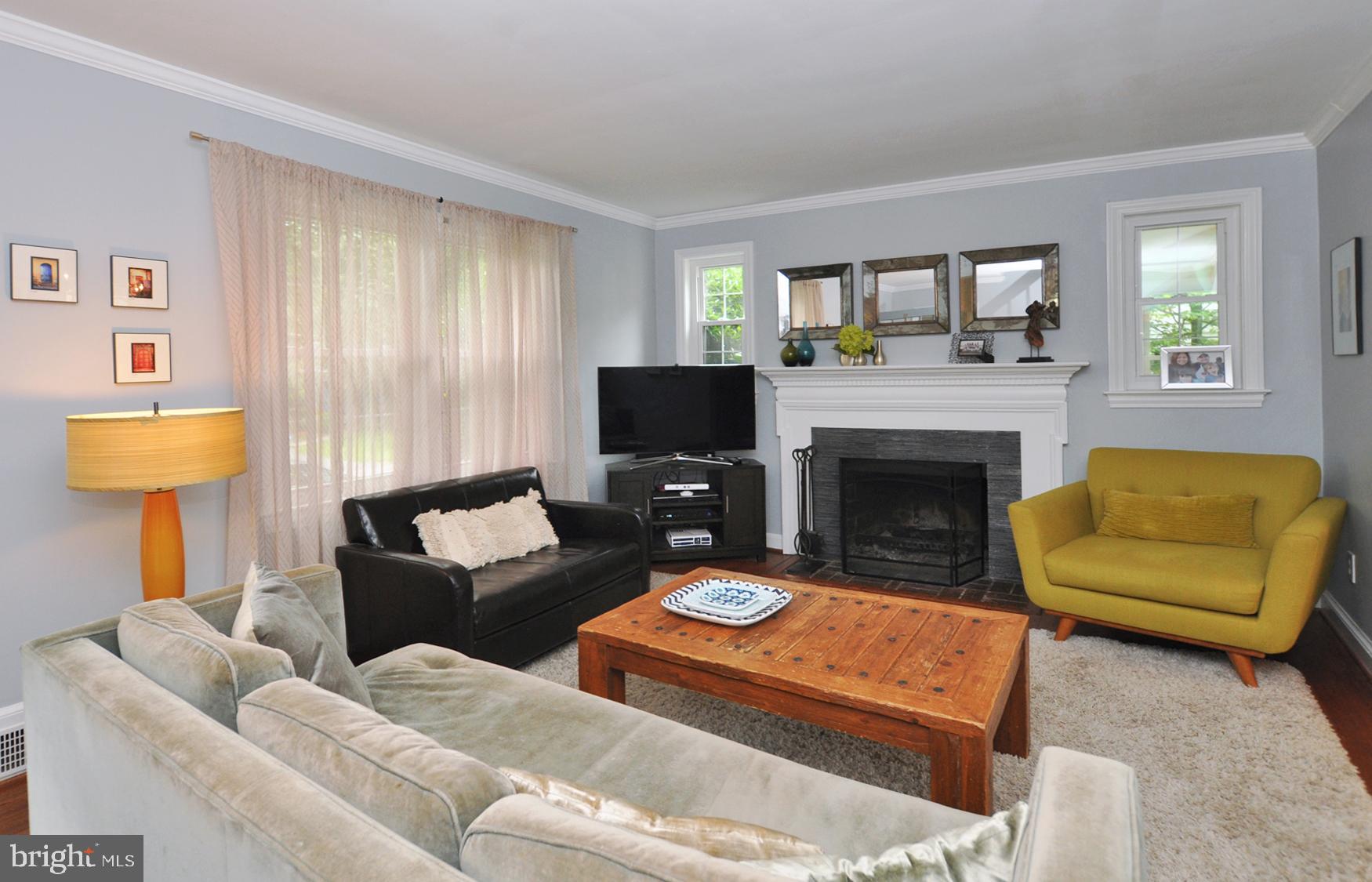 5602 Harwick Road Bethesda, MD 20816 - Photo 10 of 37 Living room w wood burning fireplace