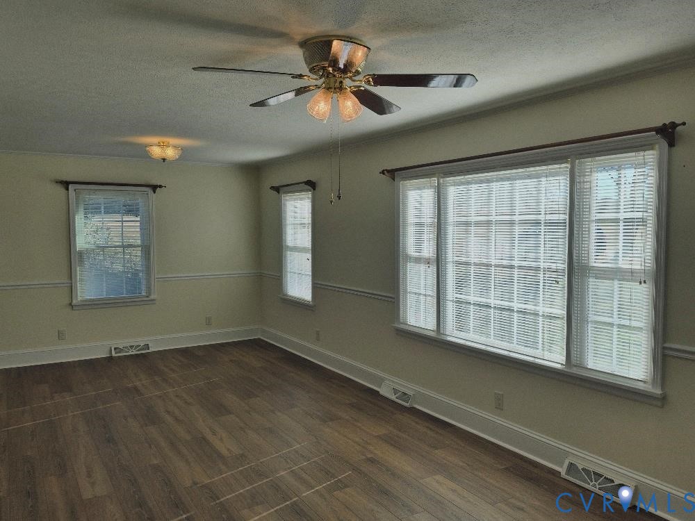 3191 Sandy River Road Burkeville, VA 23922 - Photo 4 of 15 a view of an empty room with a window