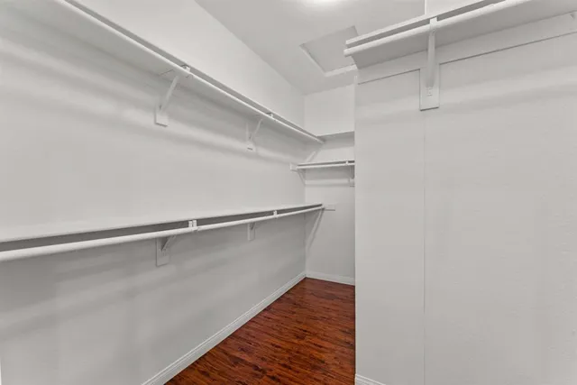 a view of an empty walk in closet