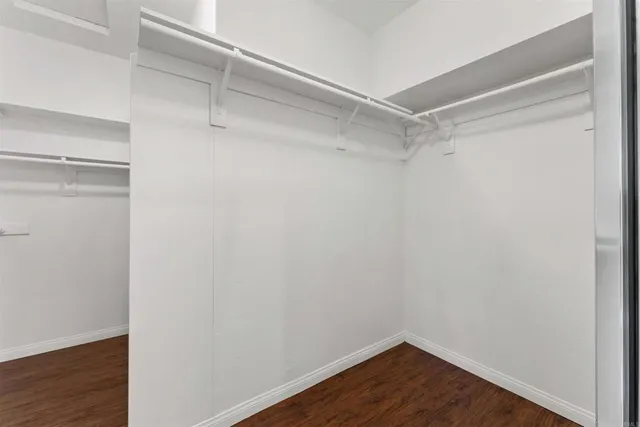 a bathroom with a sink and cabinets