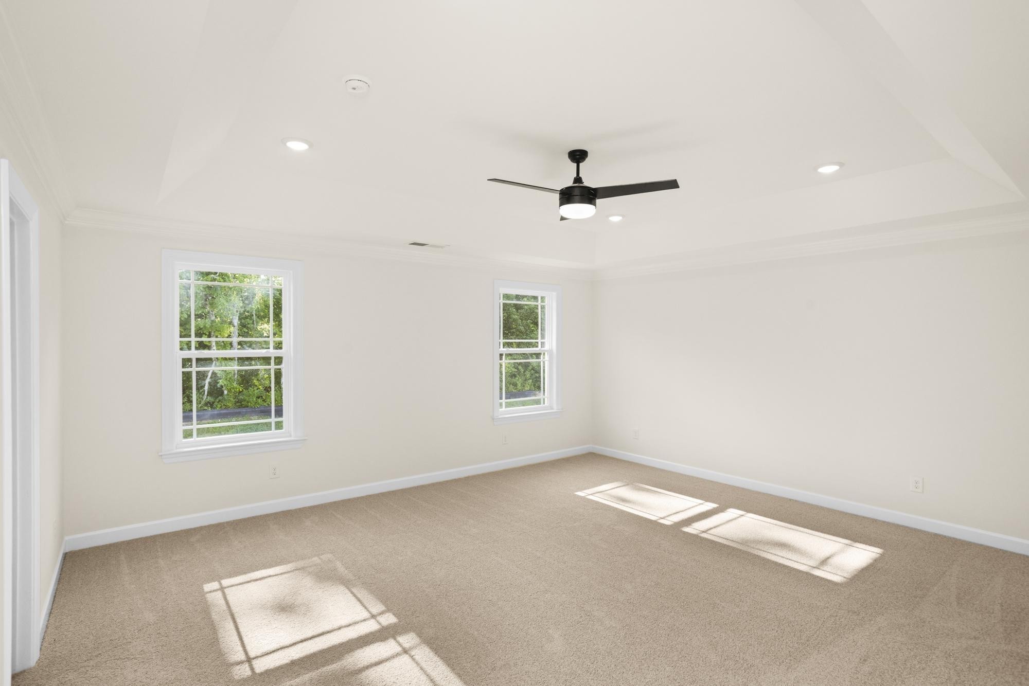 4006 Rampart Way Spring Hill Spring Hill, TN 37174 - Photo 25 of 39 an empty room with windows and view of kitchen