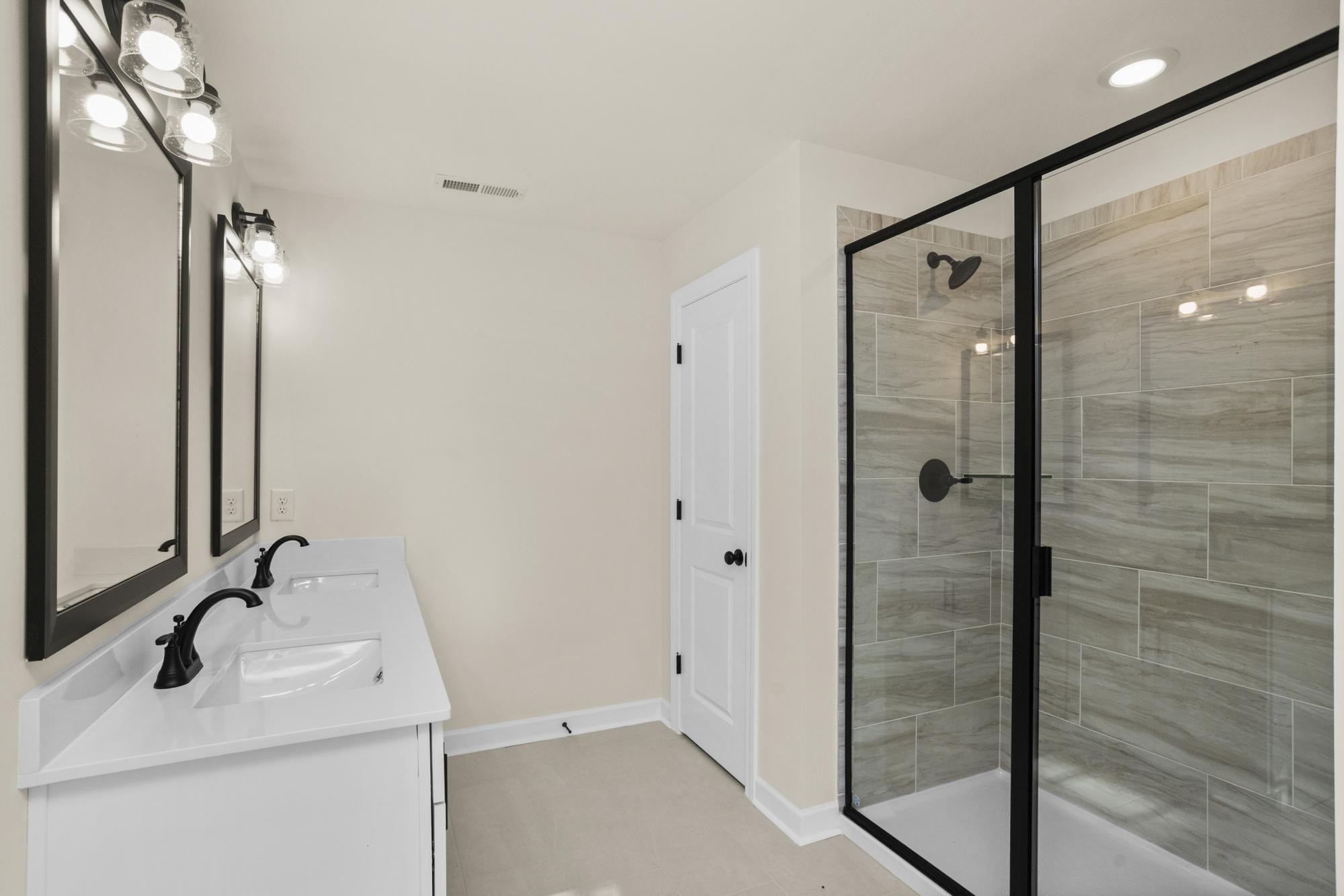 4006 Rampart Way Spring Hill Spring Hill, TN 37174 - Photo 29 of 39 a bathroom with a sink and shower