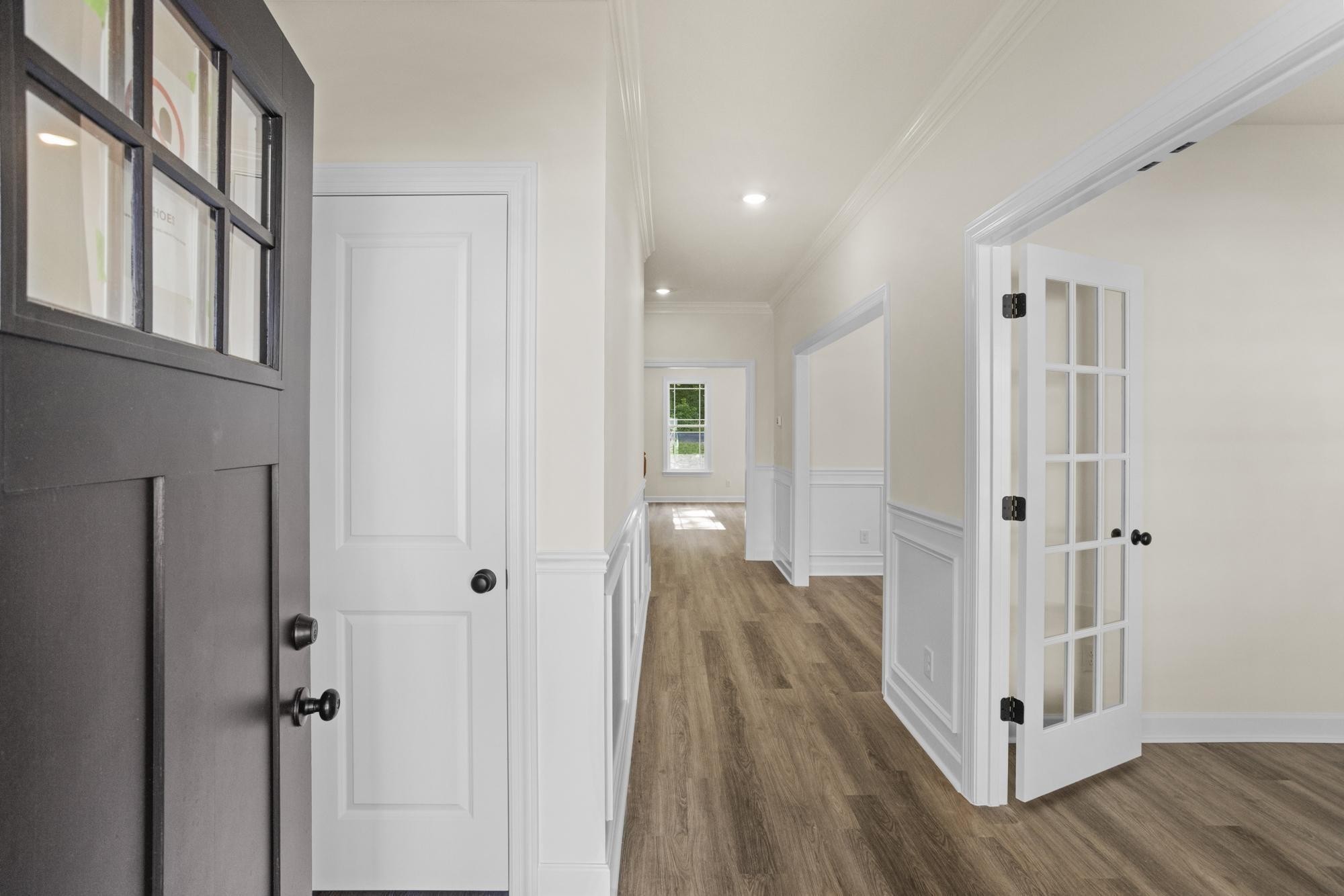 4006 Rampart Way Spring Hill Spring Hill, TN 37174 - Photo 3 of 39 a view of a hallway with wooden floor and entryway