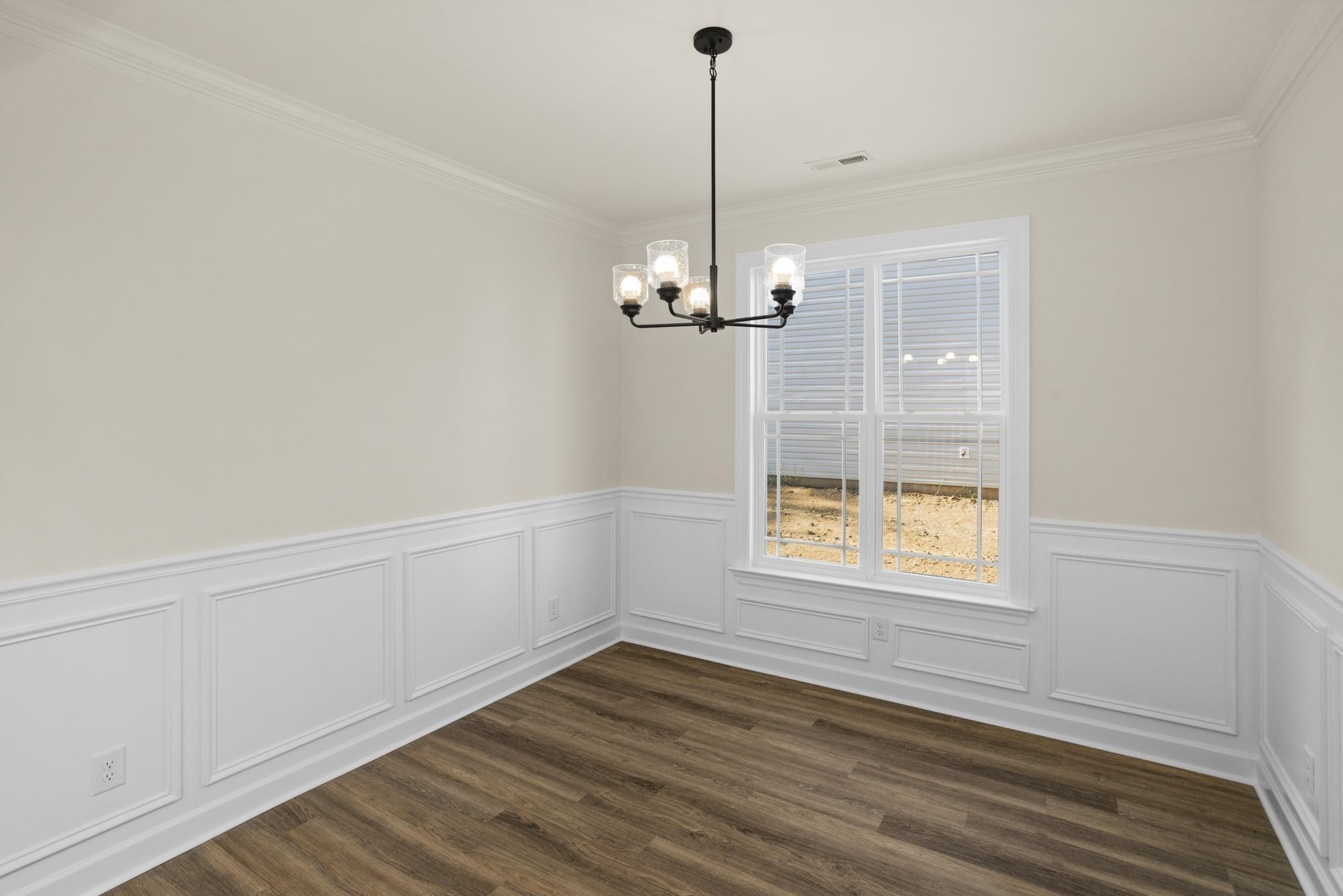 4006 Rampart Way Spring Hill Spring Hill, TN 37174 - Photo 6 of 39 a view of an empty room with wooden floor kitchen view and a window