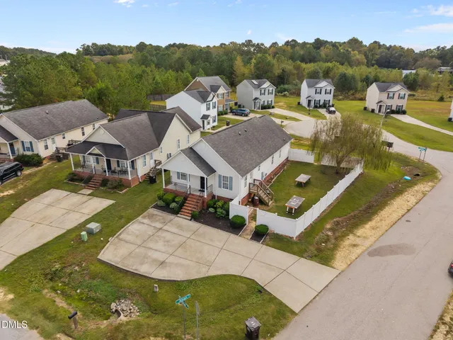 a picture of a bench in front of a building