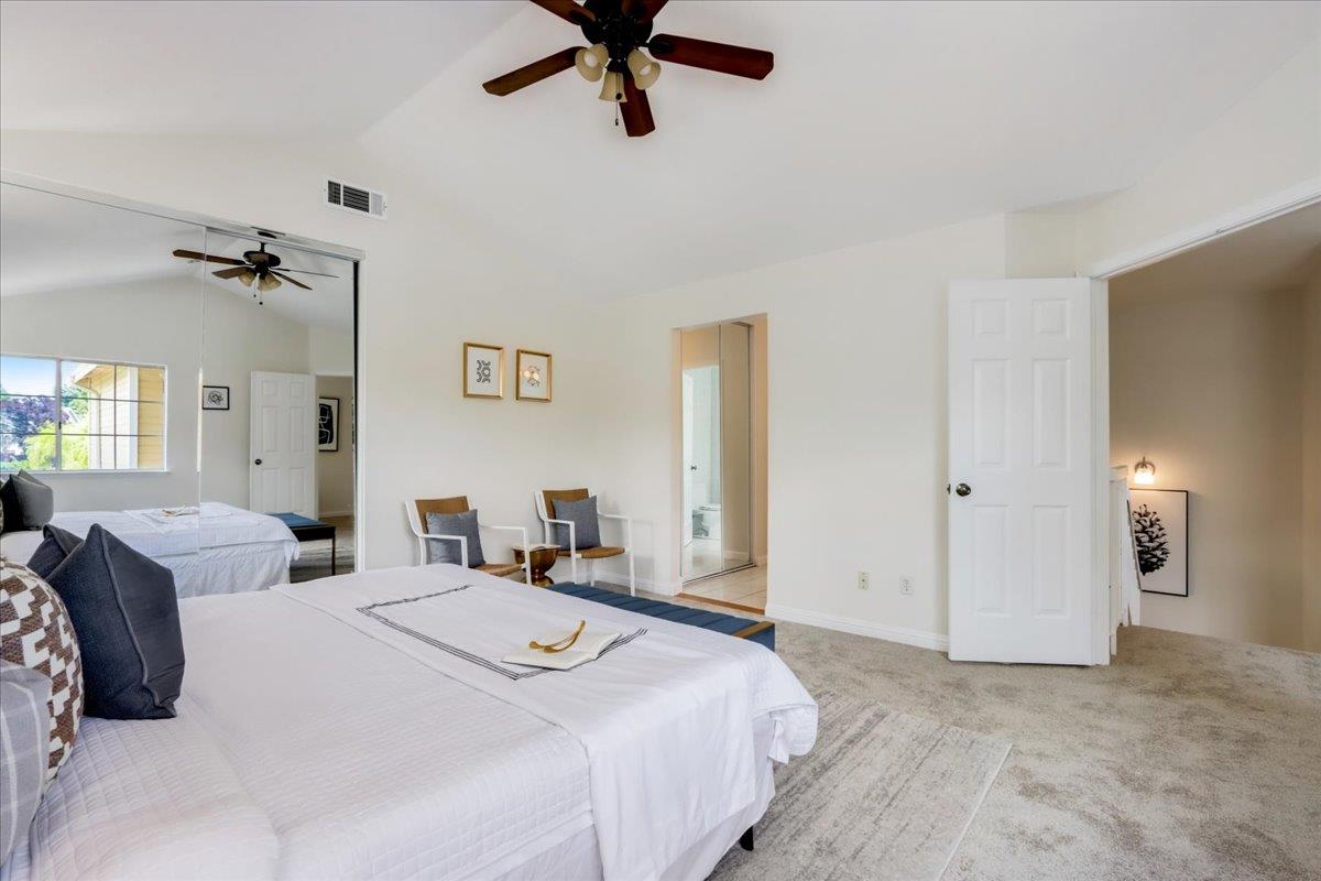 908 Springview Circle San Ramon, CA 94583 - Photo 17 of 31 a bedroom with a bed and ceiling fan