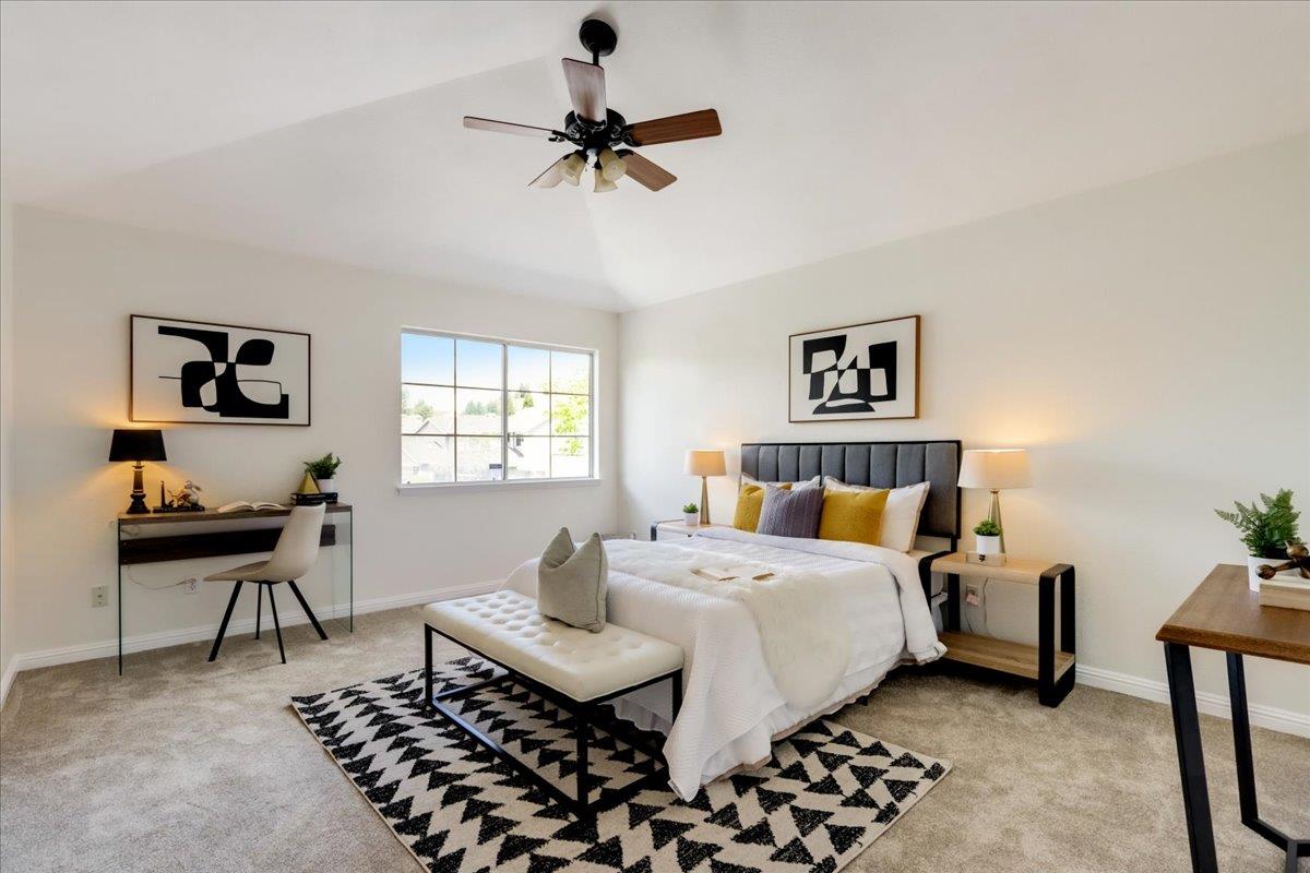 908 Springview Circle San Ramon, CA 94583 - Photo 21 of 31 a bedroom with a bed and a chandelier