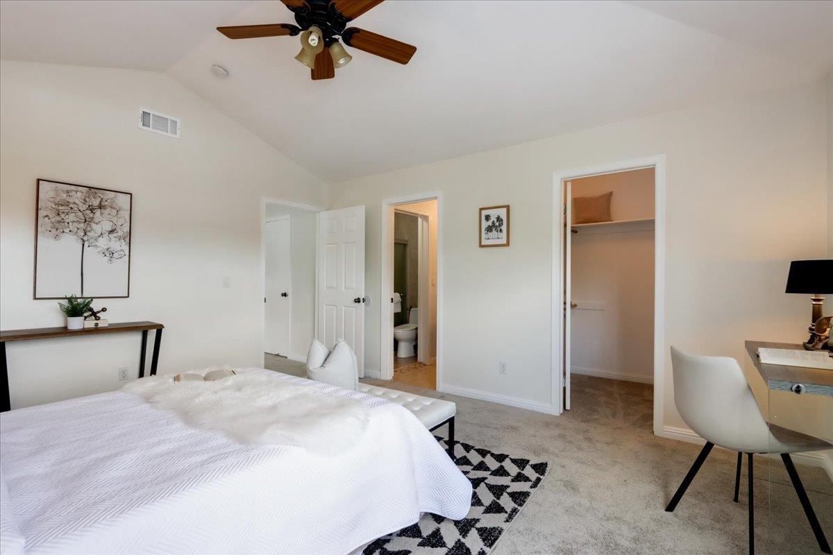 908 Springview Circle San Ramon, CA 94583 - Photo 22 of 31 a bedroom with a bed and a table in it