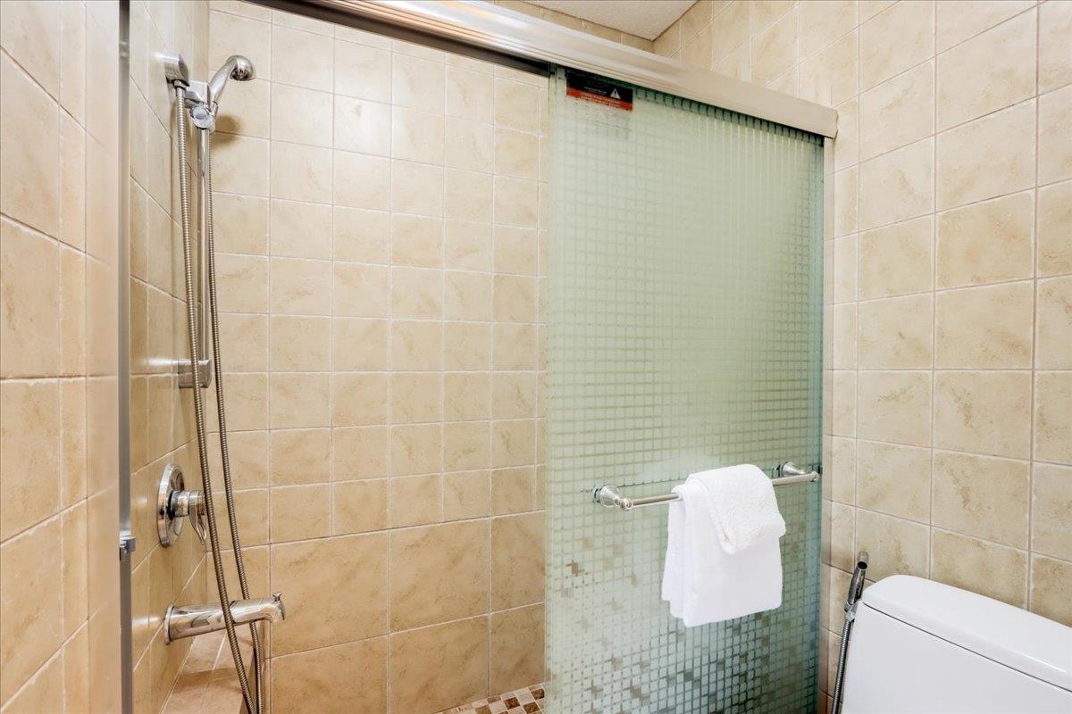 908 Springview Circle San Ramon, CA 94583 - Photo 25 of 31 a bathroom with a shower and toilet